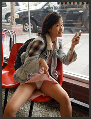 Asian Chick Flashing - Young asian girl tourist flashing her..